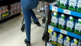 Girl walks around store with beautiful looking butt