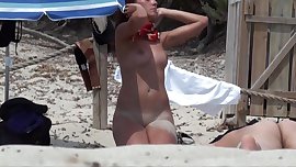 hidden cam of young nude woman on the beach