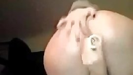 White girl masturbating with dildo and fingering her ass