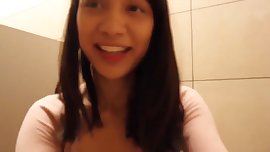 Asian Teen toys in public restroom