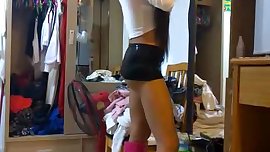 Sexy Ladyboy in micro mini skirt and pink high heel boots