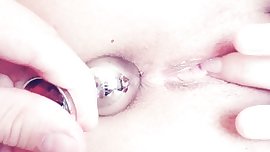Playing with a buttplug while she plays with her pussy *-*