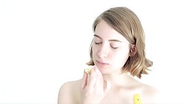 Teasing blonde babe playing with a banana