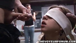 Blindfolded teen babe sucks two cocks and gets fucked