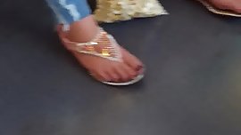 Blonde Teen with sexy feet in train