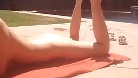 Teen babe by the pool