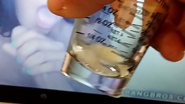 Cumshot into shotglass