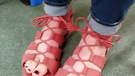 Candid feet in library